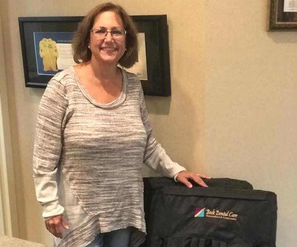 Woman posing with gift basket