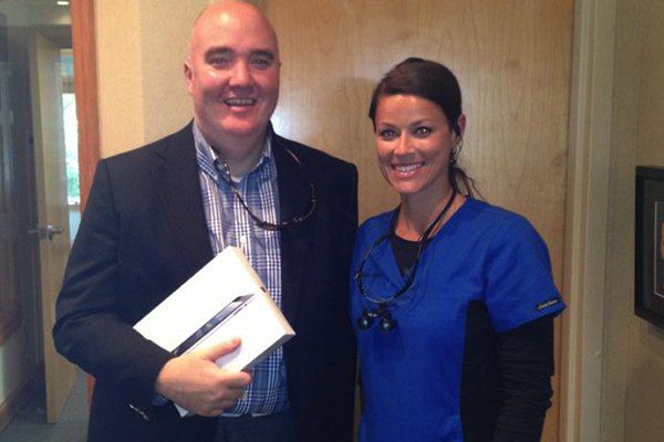 Male patient posing with iPad