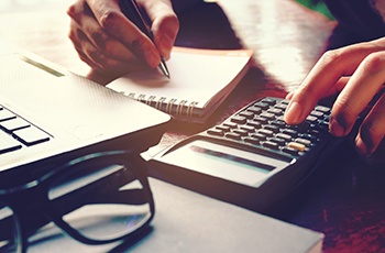 Woman using a calculator