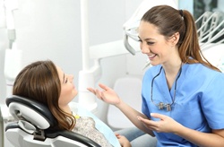 dentist chatting with patient