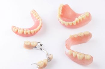 Different types of dentures in Columbia on white background