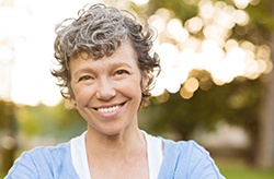 closeup of woman smiling outside