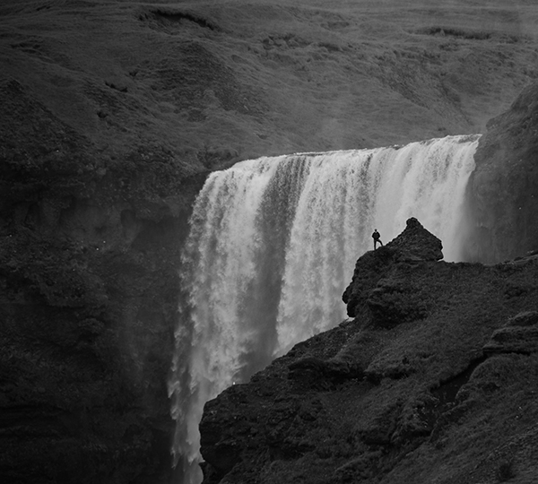 Dr. Williams in front of waterfall