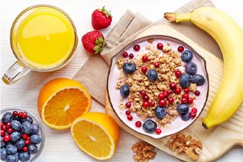 Series of healthy breakfast foods on a table