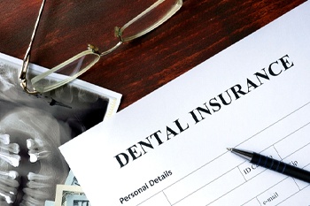 Dental insurance form for cost of tooth extraction in Columbia