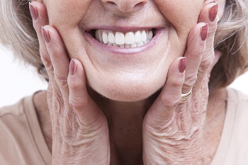 Smiling woman with dentures