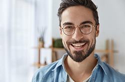 Smiling man with dental implants in Columbia