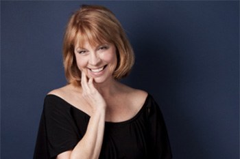 Smiling woman enjoying her new dental implants in Columbia