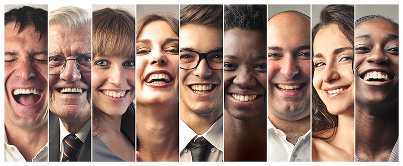 closeups of several people smiling