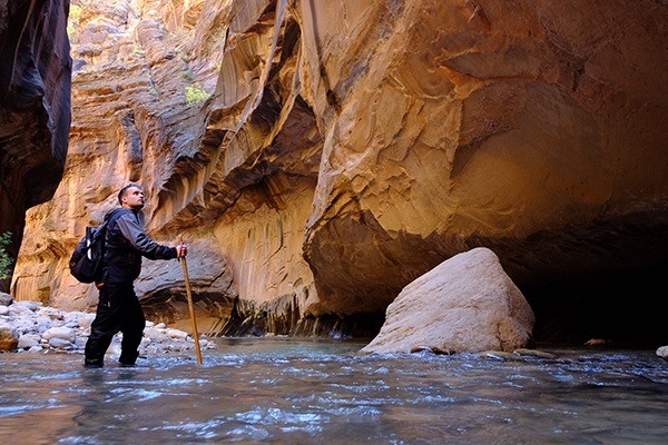 Dr. Matthews hiking outdoors