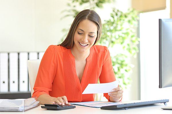 Woman looking at paperwork