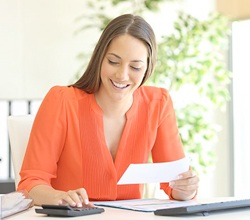 woman looking at paperwork