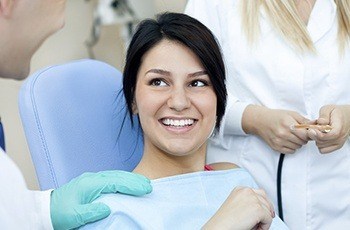 Smiling woman in dental chair