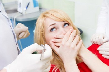 scared woman with dental anxiety in Columbia
