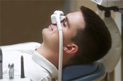 Man relaxing with nitrous oxide sedation in Columbia 