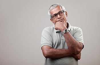 Middle-aged man thinking