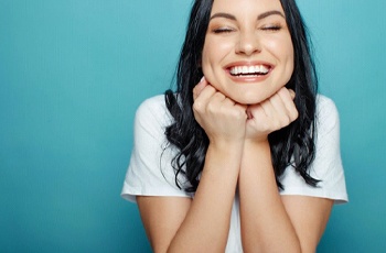 woman grinning after a smile makeover in Columbia, TN