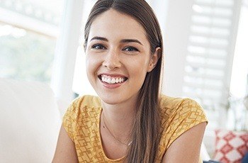 Woman sharing brilliant smile after teeth whitening