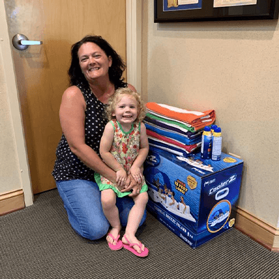 Mother and daughter with summer gift set prize