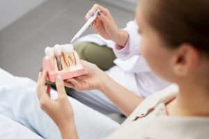 woman at a dental implant consultation in Columbia 