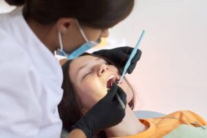 Young female having dental work done