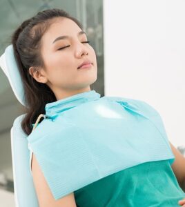 Young woman sedated at dentist