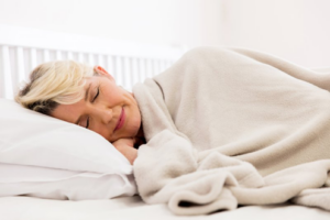 Woman sleeping peacefully in her home