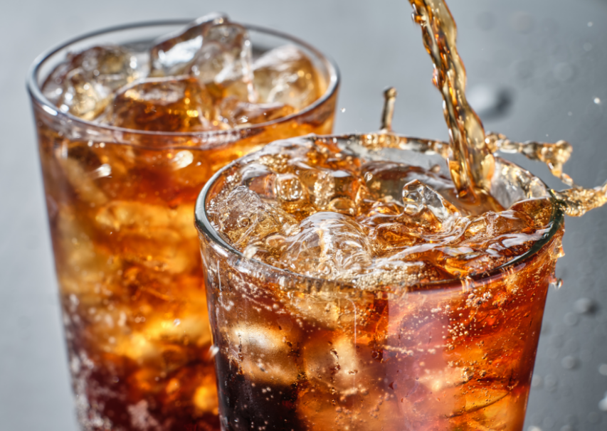 Two glasses of soda with ice