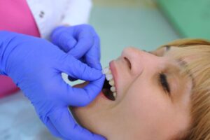 Cosmetic dentistry patient receiving veneers 