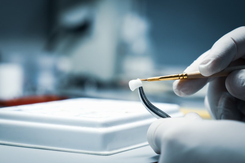 A dental lab processing a dental crown