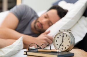 Man sleeping after his wisdom teeth extractions